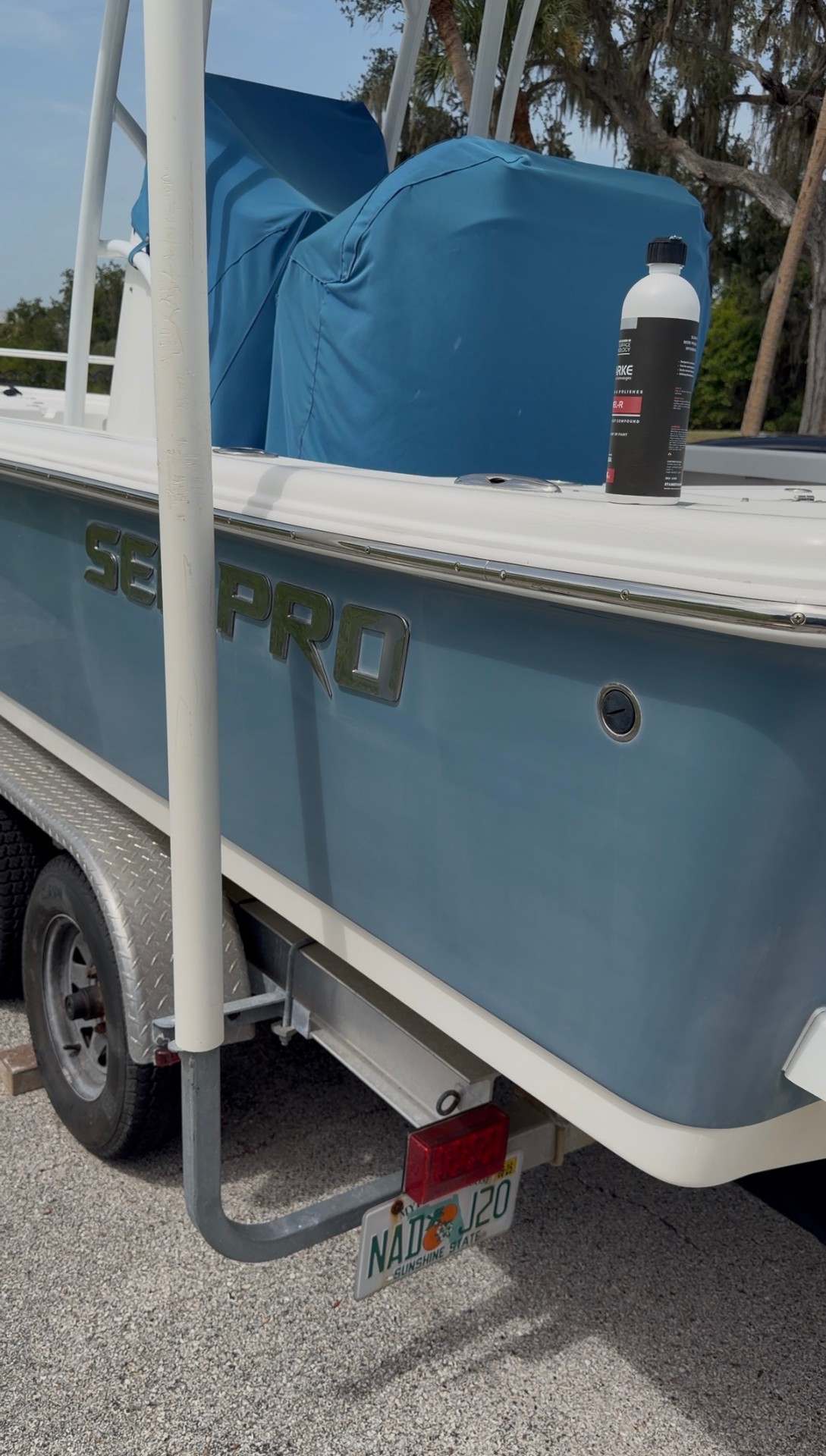 Sea Pro center console with restored, glossy blue hull after restoration